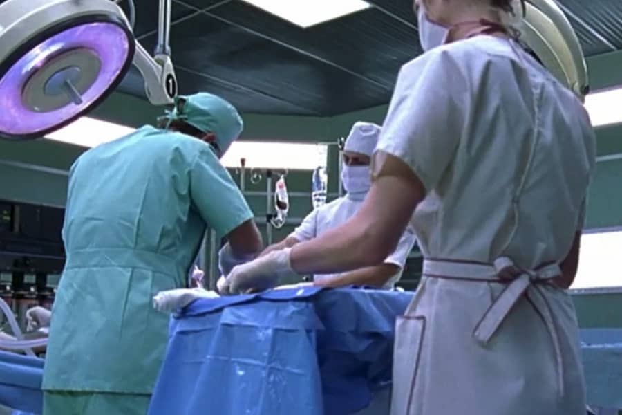 medical staff around an operating table