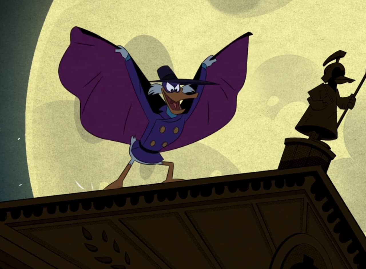 Darkwing Duck spreads his cape atop a building against a full moon