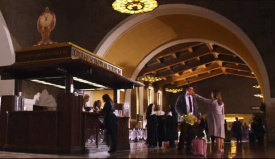 Bryce meeting Madison with flowers at Grand Central Station