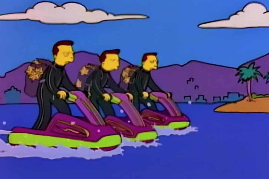 three bad guys riding jetskis with backpacks full of starfish