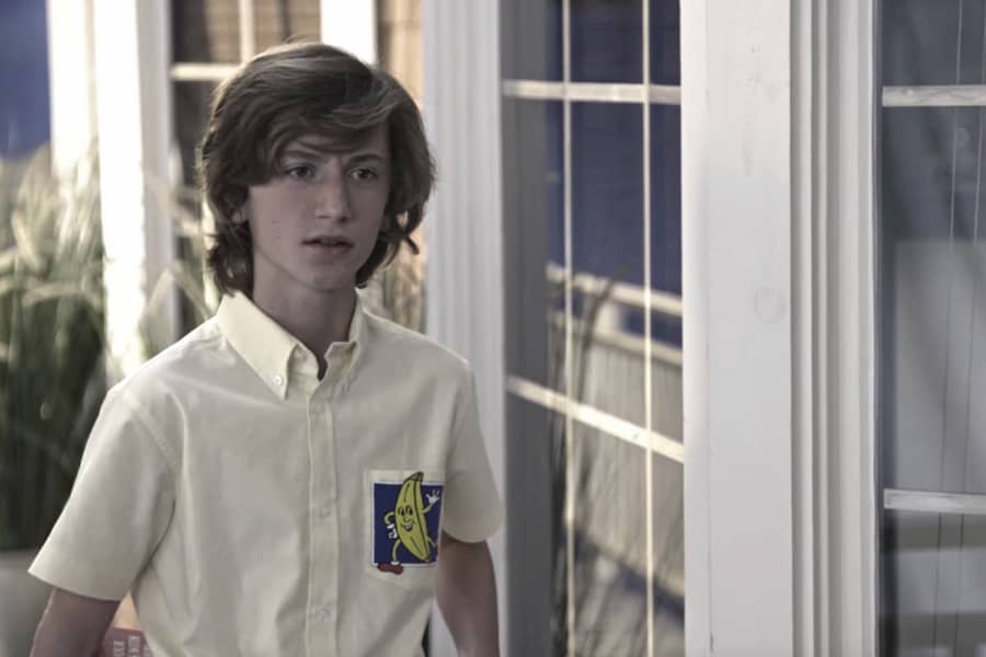 young Michael Bluth in his banana stand uniform