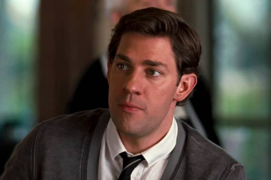 John Krasinski in a tie and sweater