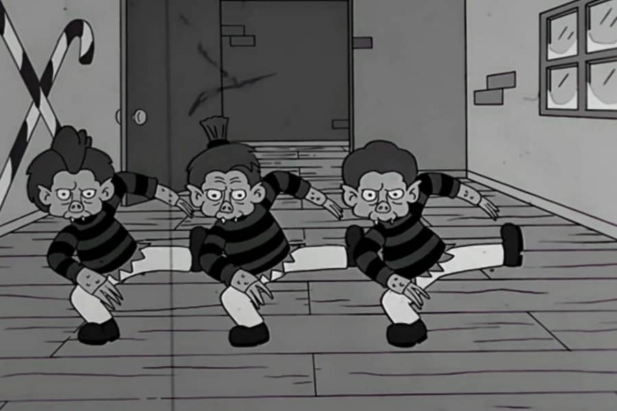 three goblins dance walk in unison