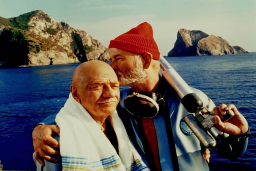 Zissou kisses the bald head of Esteban du Plantier