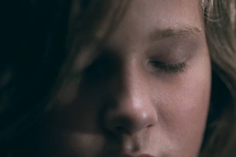 closeup of Lt. Howser thinking with his eyes closed