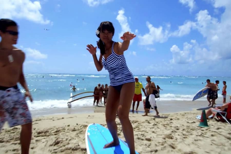 Walker getting surfing lessons in Hawaii